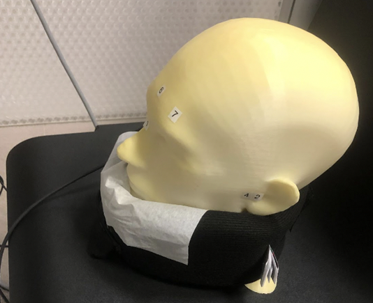 Neck brace with tissue for sanitary purposes